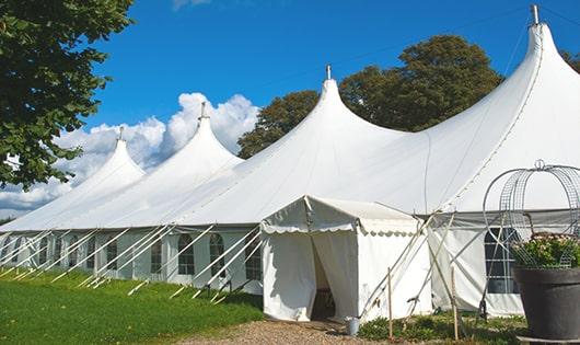 portable restrooms arranged for a event, providing quick and easy access for attendees in Johnston